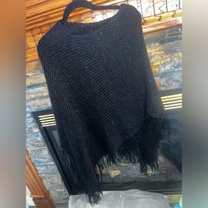 Beautiful new boutique Poncho. One size fits most.